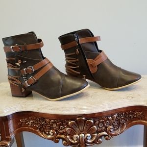 Ankle boots unique designed with straps and metal